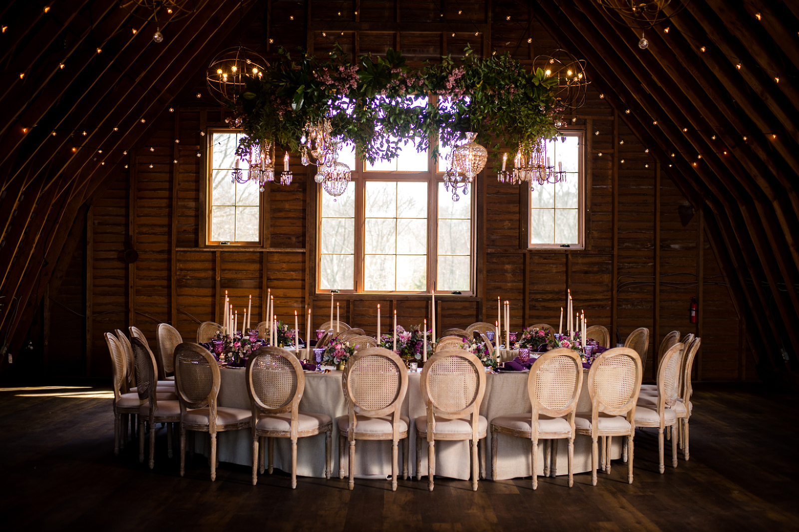 Upper Level Barn Seating in the Round and Overhead Floral Chandelier